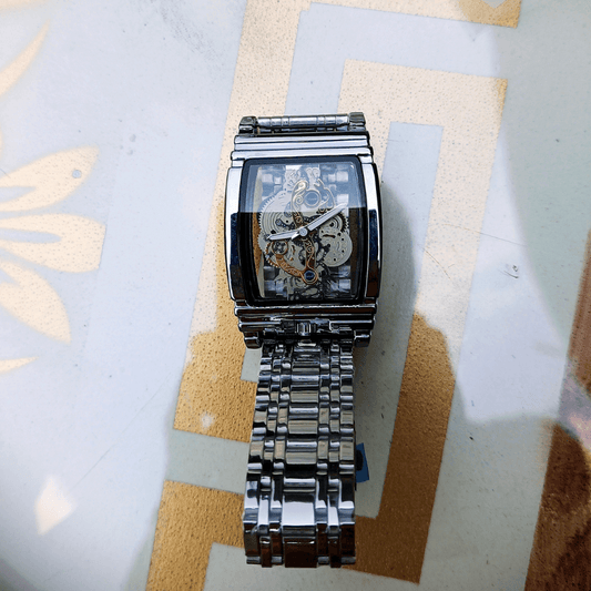 Men's Luxury Hollow-Out Quartz Watch – Luminous Dial & Steel Band